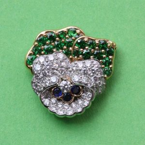 Vintage Tiffany and Co Diamond, Tsavorite Garnet and Sapphire Pansy Flower Brooch; set with 1.10ct tsavorite garnets and 2.10cts brilliant diamonds, Signed
