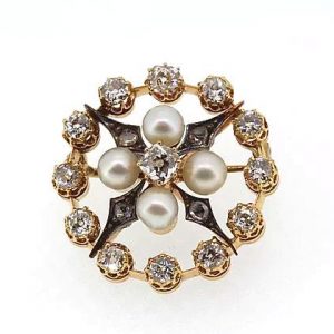 Antique Natural Pearl and Old Cut Diamond Brooch; circular brooch set with old cut diamonds and natural pearls, in silver and high carat gold