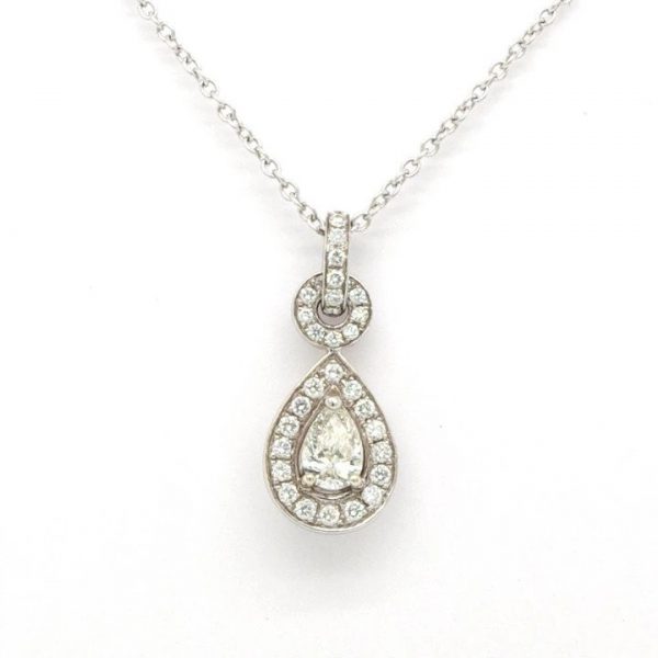 Pear Shaped Diamond Cluster Drop Pendant; 0.31ct pear diamond surrounded by diamonds, on diamond set bale, 0.56ct total, 18ct white gold.