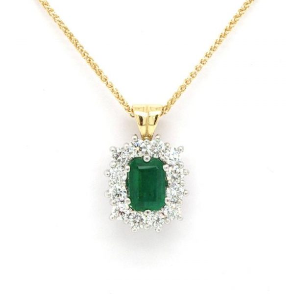 0.94ct Emerald and Diamond Cluster Pendant; emerald-cut emerald with diamond surround, in 18ct white gold, on 18ct yellow gold bale and chain