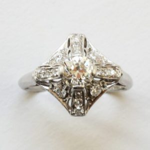 Art Deco Old Cut Diamond and Platinum Ring, set with 0.90cts old cut diamonds. Circa 1920. Signed: Peacock, for C.D. Peacock from Chicago, America