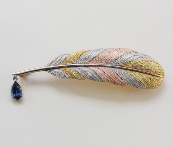 Antique Sapphire, Platinum and Gold Feather Quill Pen Brooch; A brooch representing a quill pen, 0.45ct sapphire drop; platinum and gold feather