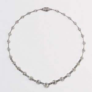 Art Deco Graduated Old Cut Diamond Necklace, 10 carats, thirty-two old-cut diamonds, collet-set with millegrain border, gate-bar links, 18ct white gold.