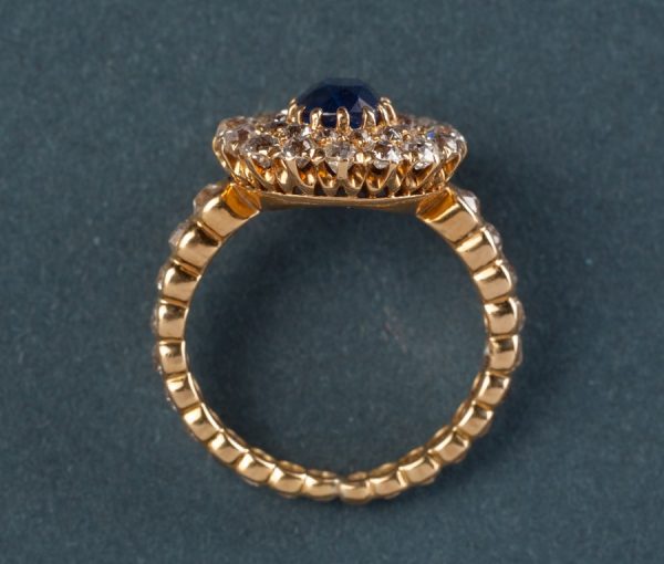 Antique Edwardian 1.5ct Oval sapphire and 2.5cts Old Cut Diamond Cluster Ring, Circa 1910
