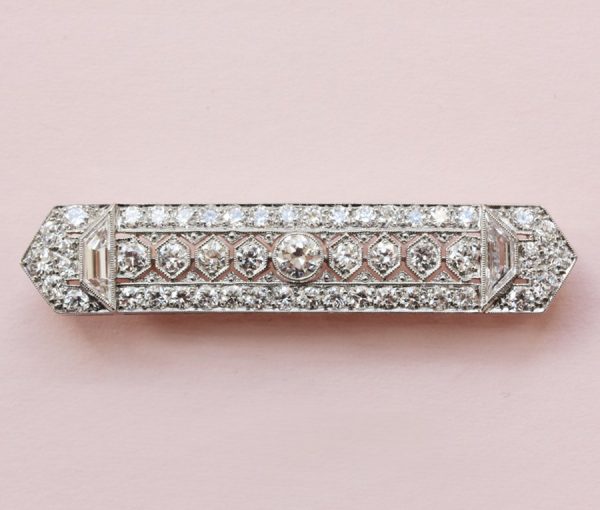 Art Deco Tiffany and Co 3.6ct Diamond Set Platinum Bar Brooch; set with brilliant-cut diamonds and two trapezium-cut diamonds, 3.60 carats, gold pin, Signed