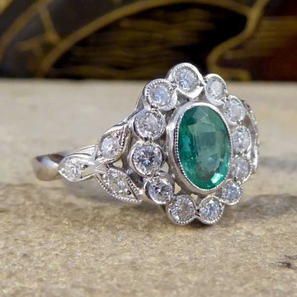 Edwardian Style Emerald and Diamond Oval Cluster Platinum Ring
