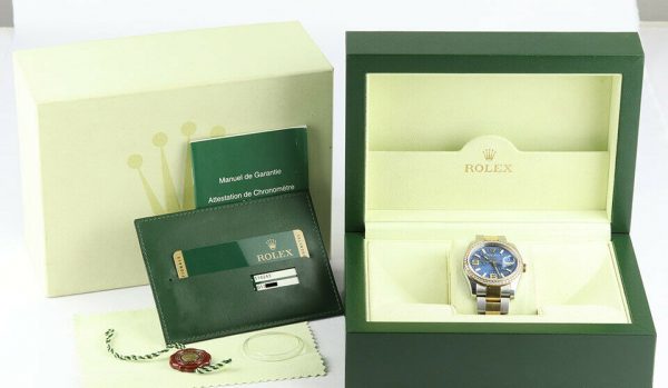 Rolex Mens Datejust 116243 Steel and Gold 36mm Automatic Watch, blue dial, diamond bezel, Two diamond Arabic numerals, screw-down crown, sapphire crystal, Oyster bracelet. With Rolex box and papers, tag and bezel protector.