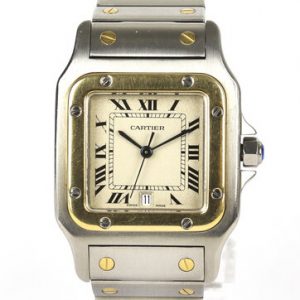 Cartier Santos Galbée 29mm Steel and Gold Quartz Square Watch, white dial, Roman numerals, date aperture at 6, blue steel hands, sapphire crystal glass, faceted blue gem set crown, stainless steel and yellow gold bracelet, with a stainless steel single deployment clasp