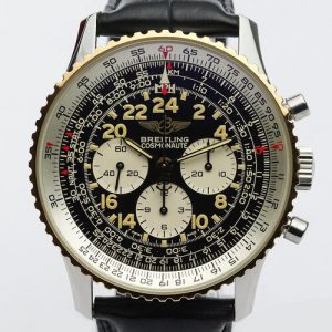 Breitling Navitimer Cosmonaute 41mm Steel and Gold Manual Watch, rotating bezel, black dial, Arabic numerals, chronograph function, sapphire crystal, on a black leather strap with Breitling pin buckle, with Breitling papers.