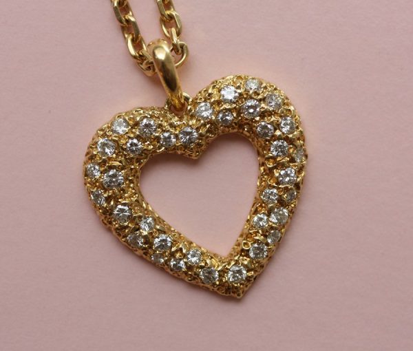 Cartier Diamond Set Open Heart 'Sirene' Pendant and Chain, brilliant-cut diamonds with 1.80 carat total, Signed and Numbered Cartier, Paris, 122123 and 11479
