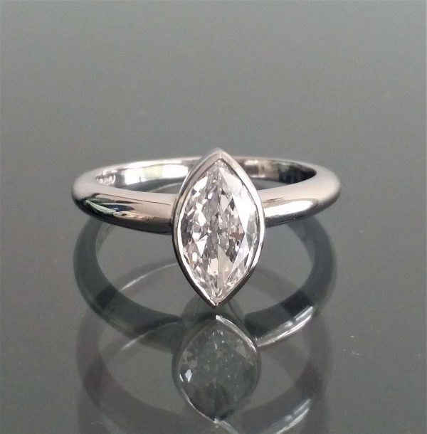 Vintage 1.00ct Marquise Cut Diamond Solitaire Ring, mounted in a new simple rub over platinum setting, colour D, clarity VS2, unique engagement ring