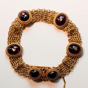 Antique Georgian Neo Etruscan Garnet, Diamond and 18ct Gold Bracelet; finely woven 18ct gold bracelet set with six large cabochon cut garnets