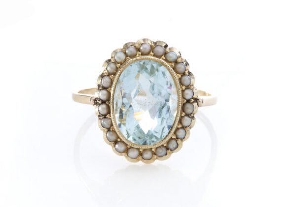 Vintage 1940s Aquamarine and Natural Pearl Oval Cluster Ring, 3.50 carat oval aquamarine surrounded by natural pearls, in 18ct yellow gold.