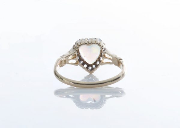 Antique Victorian Opal and Rose Cut Diamond Heart Cluster Ring; 0.75ct heart shaped opal surrounded by 0.36cts rose cut diamonds, 18ct yellow gold, Circa 1865