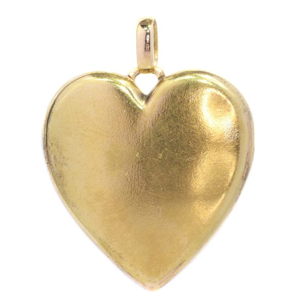 Victorian gold heart shaped locket set with diamonds and rubies