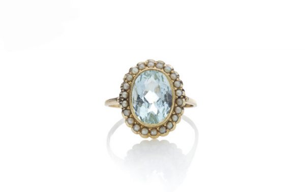 Vintage 1940s Aquamarine and Natural Pearl Oval Cluster Ring, 3.50 carat oval aquamarine surrounded by natural pearls, in 18ct yellow gold.