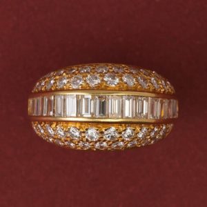 Vintage 3.20ct Diamond Bombe Dress Ring; set with a band of baguette-cut diamonds, surrounded by brilliant cut diamonds, 18ct yellow gold