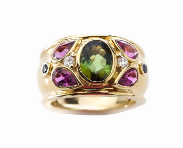 Cartier Multi Gem set 18ct Yellow Gold Ring, set with green tourmaline, pink tourmalines, sapphires and diamonds. Signed, 1994, with original box.