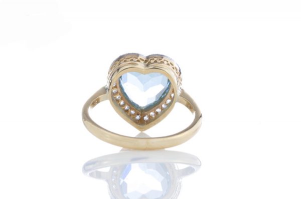 Edwardian Style Aquamarine and Diamond Heart Shaped Cluster Ring; 6.00ct heart cut aquamarine surrounded by 0.52cts rose-cut diamonds, 18ct yellow gold