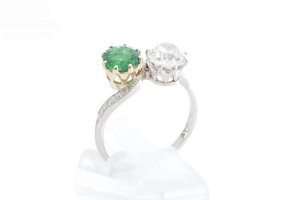 Natural Colombian Emerald and Diamond Crossover Ring in Platinum; set with 1.00ct natural emerald and 1.50ct old cut diamond, diamond set shoulders