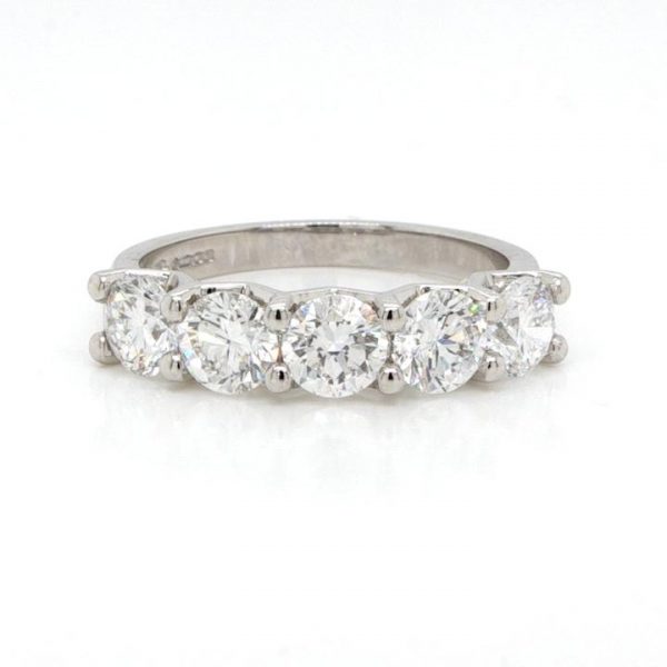 Five Stone Diamond Ring, five sparkling brilliant cut diamonds, 2.03 carat total, claw-set, mounted in Platinum.