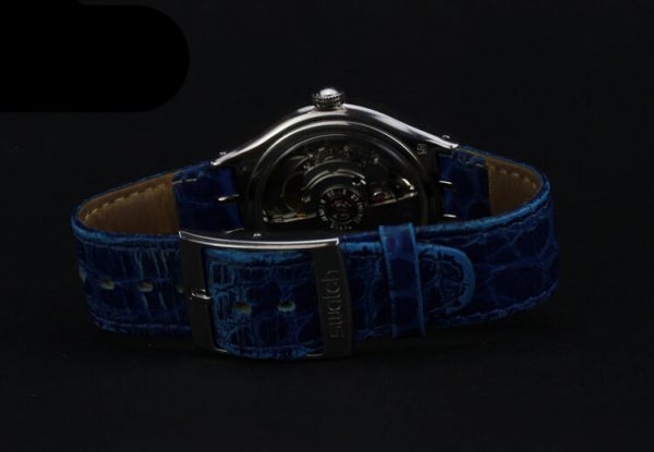 Swatch Tresor Magique Platinum 36mm Automatic Wrist Watch, on a blue leather strap, Circa 2000s