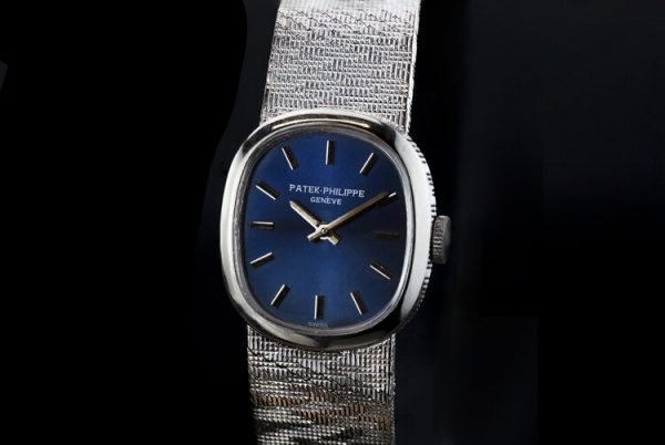 Patek Philippe Mini Ellipse 18ct White Gold Ladies Vintage Manual Watch, Ref 4226, sunburst blue dial, on an 18ct Patek Philippe bracelet strap, Circa 1980