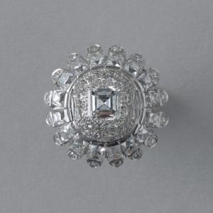 Vintage 10ct Diamond and Platinum Domed Cluster Bombe Cocktail Ring; set with carré, brilliant, French and single-cut diamonds, 10.00 carat total, Circa 1950s