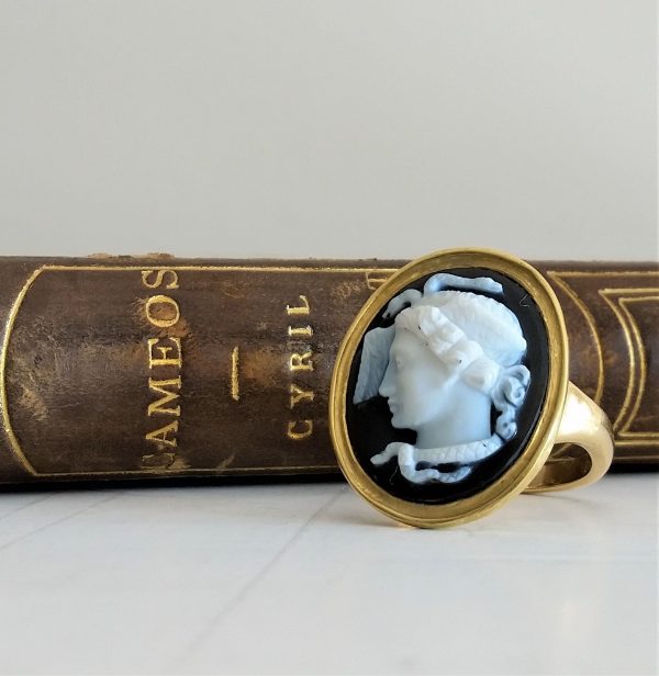 Antique Hardstone Medusa Cameo Ring; mid 19th century carved agate Medusa head cameo, in later Roman style 18ct gold ring mount.