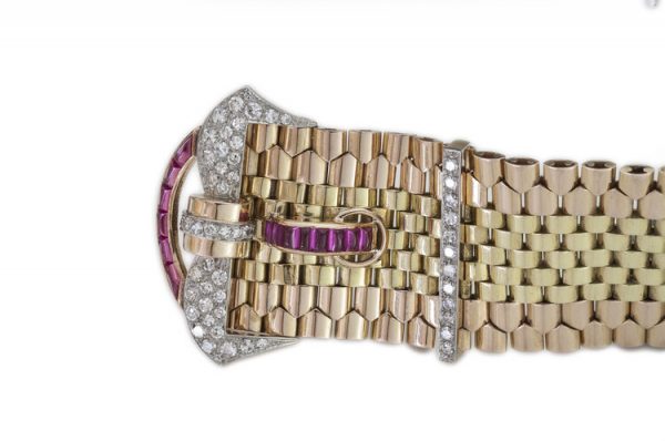 Vintage Tiffany and Co 18ct Gold Belt Buckle Style Bracelet set with rubies and diamonds. Circa 1940s.
