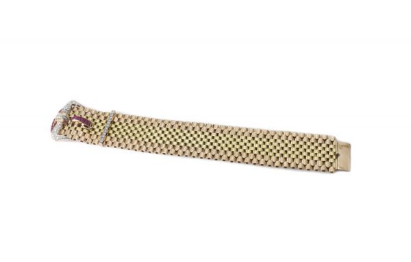 Vintage Tiffany and Co 18ct Gold Belt Buckle Style Bracelet set with rubies and diamonds. Circa 1940s.