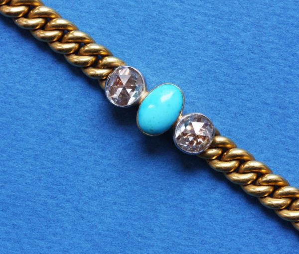 Antique Edwardian Turquoise, Rose Cut Diamond and 18ct Gold Bracelet; oval cabochon turquoise flanked by rose-cut diamonds, on 18ct yellow gold gourmet link bracelet.