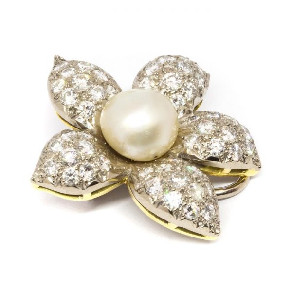Vintage Natural Pearl and Diamond Flower Earrings; central 10mm natural pearls surrounded by 11.00 carats pavé set diamond petals. Circa 1950