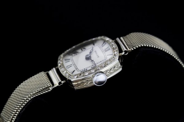 Rolex Art Deco Ladies Diamond Set 18ct White Gold Watch; 18ct Rolex case set with rose-cut diamonds, on a 9ct white gold mesh strap, case hallmarked R.W.C LTD Rolex watch company limited