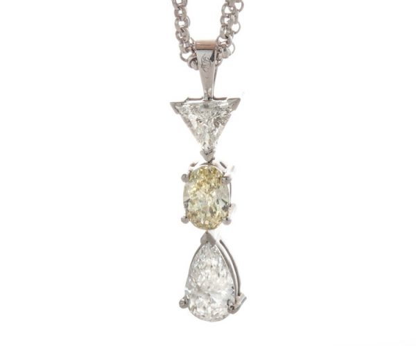Filk Italian Diamond Drop Necklace, 1.55cts, oval fancy yellow diamond, triangular and pear-cut diamond, VVS clarity, F colour, Circa 1990's