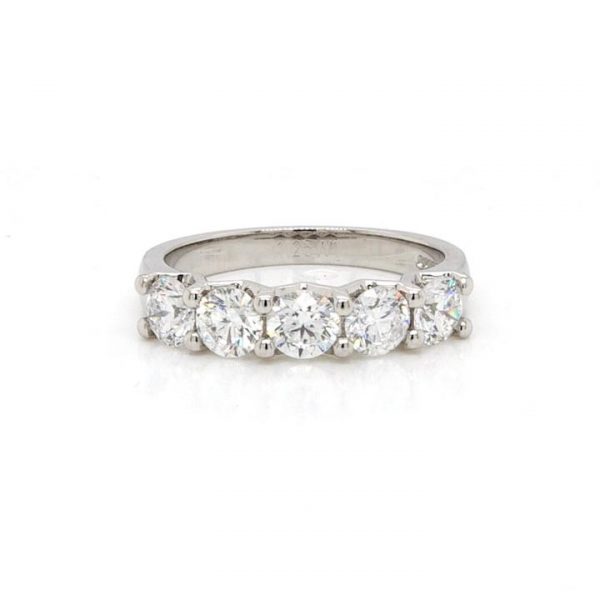 Five Stone Diamond Ring; featuring five round brilliant cut diamonds, 1.25 carat total, claw-set, mounted in platinum.