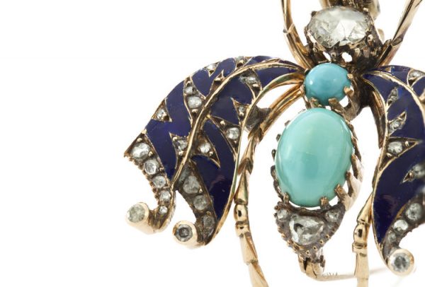 Antique Victorian 15ct Yellow Gold Insect Bug Brooch; set with turquoise stones for the body, wings detailed with blue enamel and rose-cut diamonds, accented with ruby set eyes. Circa 1860s