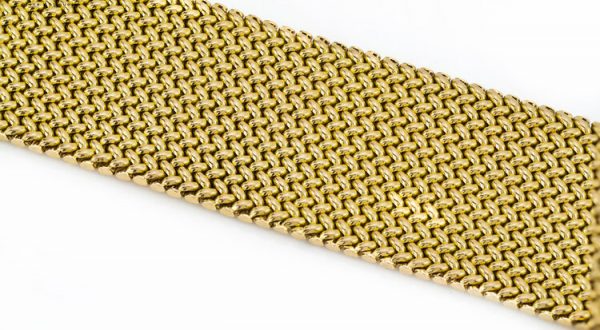 Vintage 18ct Yellow Gold Woven Bracelet, with 0.47ct Brilliant-cut Diamond set Clasp, accented with a tassel fringe, Circa 1970s