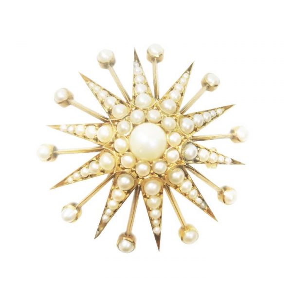 Antique Victorian Pearl and 15ct Yellow Gold Star Brooch Pendant; featuring creamy seed pearls set within 15ct yellow gold star burst gallery