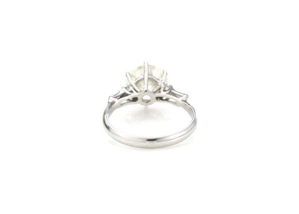 Art Deco Diamond and Platinum Engagement Ring; 3.02ct old European cut diamond with baguette-cut diamond-set shoulders, with GCS certificate