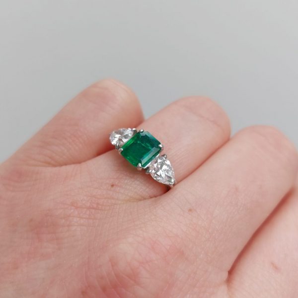 Emerald and Pear Shaped Diamond Three Stone Ring