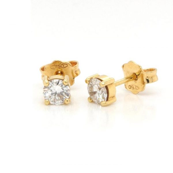 Pair of Diamond Single Stone Stud Earrings; set with 0.47 carats round brilliant cut diamonds, in 18ct yellow gold, G/H colour, SI clarity