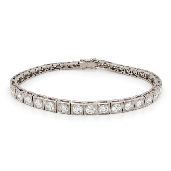 Art Deco Diamond Line Bracelet; with 41 articulated sections crafted from platinum, with each centrally set with a brilliant cut diamond, 4.40 carat total