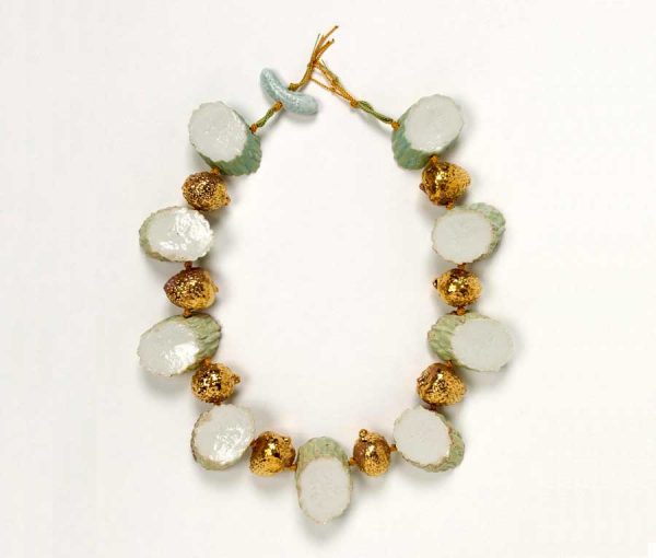 Contemporary Pauline Weirtz Cucumber and Strawberry Beaded Necklace; consisting of gilt and painted ceramic cucumber and strawberry shaped beads