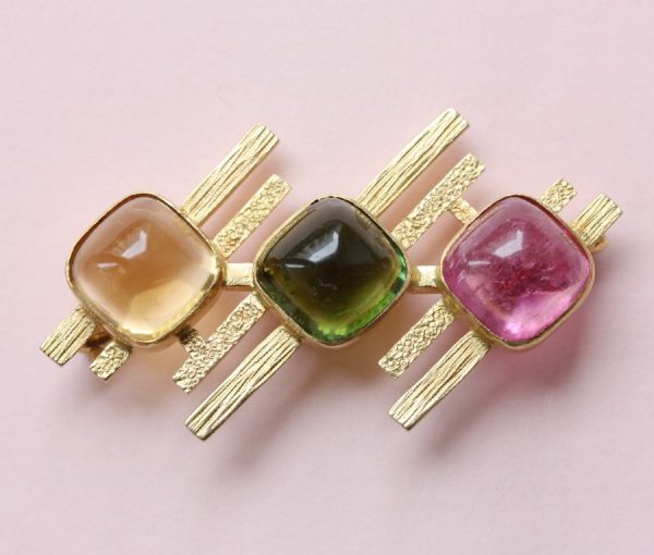Vintage 1970s Tourmaline, Citrine and 18ct Gold Geometric Bar Brooch; set with a sugarloaf cut pink and green tourmaline and citrine, Signed: MK(J)LTD. Chester. Circa 1968-1977