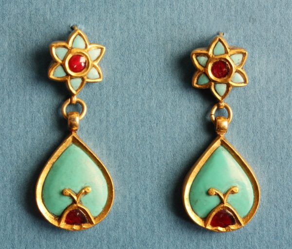 Vintage Turquoise, Ruby and Gold Drop Earrings; turquoise and ruby pear shaped drops suspended from a turquoise and ruby star shaped stud. Mounted in gold.