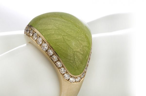 Fabergé Green Enamel, Diamond, 18ct Gold Limited Edition Ring; central domed panel applied with green enamel with a delicate leaf design, edged by 1.60cts brilliant-cut diamonds