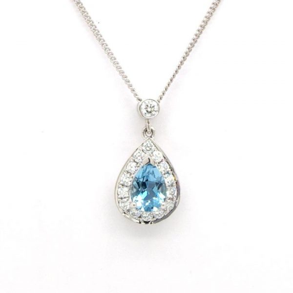 Aquamarine Jewellery Diamond Pear Shaped Drop Pendant; featuring a 0.65ct pear-shaped aquamarine within a 0.30 diamond cluster setting, 18ct white gold