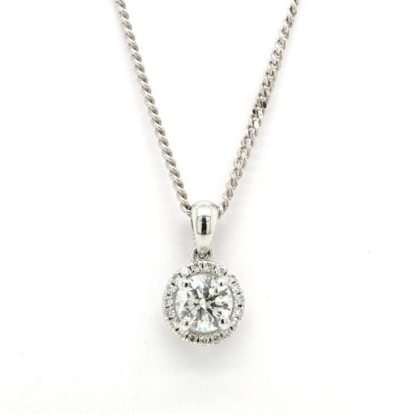Diamond Cluster Pendant. 0.59 carat total, in 18ct White Gold, presented on an 18ct white gold chain, 16" chain length
