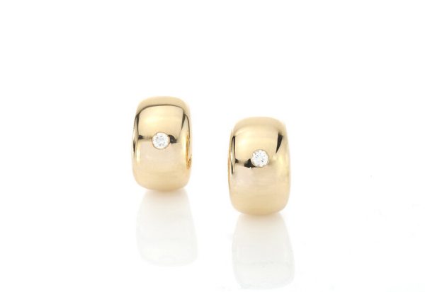 Cartier Vintage 18ct Yellow Gold and Diamond Clip On Earrings; each set with a round brilliant-cut diamond, 0.14 carat total, with original box, Circa 1990s